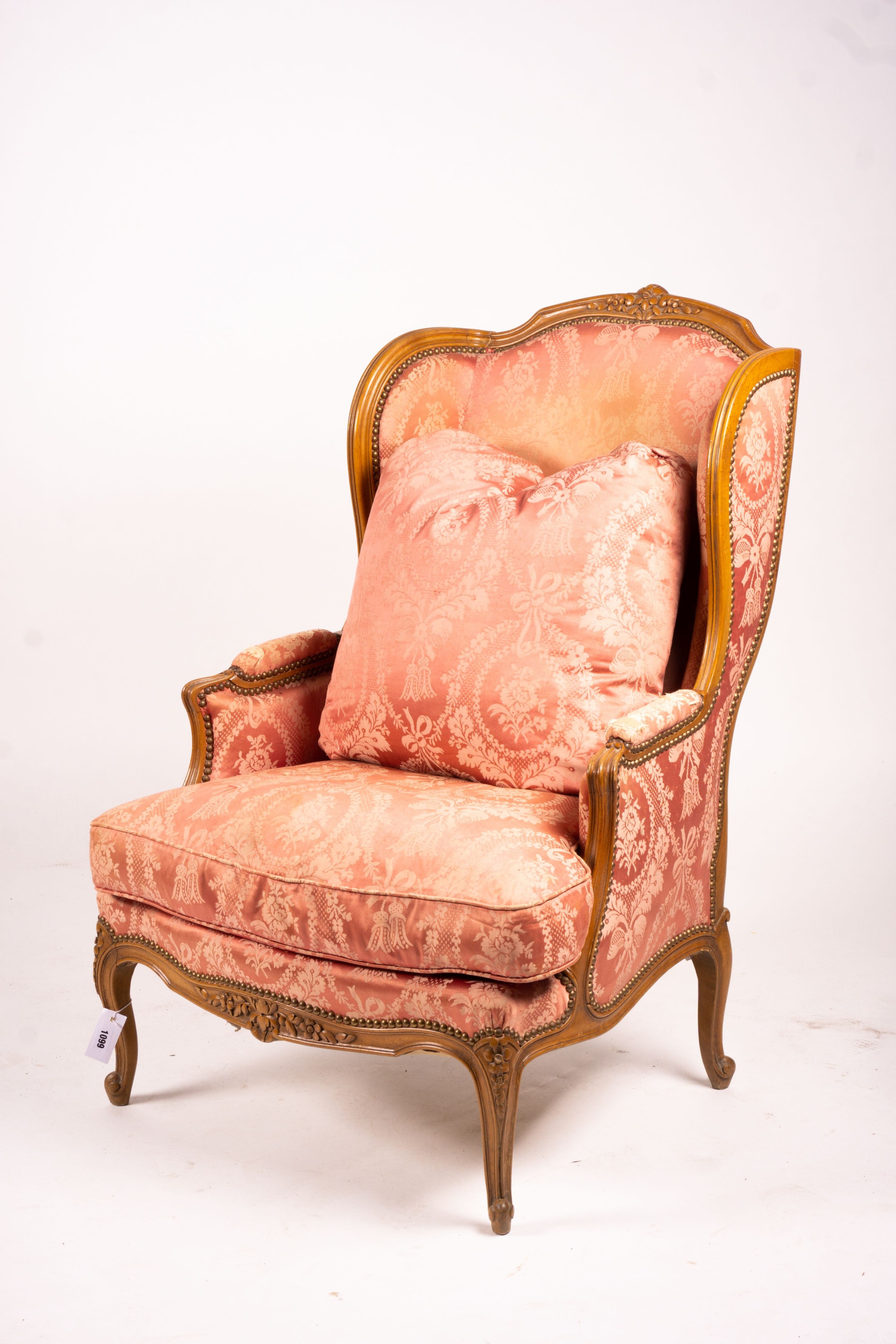 A pair of early 20th century French carved beech armchairs, width 75cm, depth 78cm, height 110cm